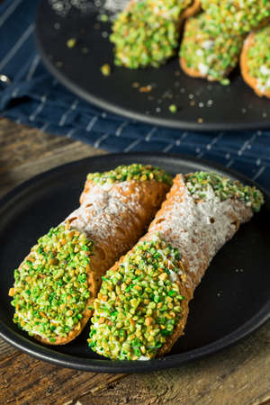 Traditional Homemade Sicilian Cannolis with Pistachiosの写真素材