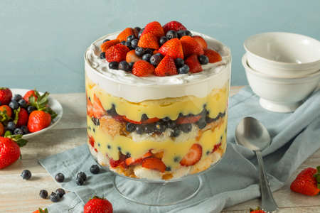 Sweet Homemade Strawberry Trifle Dessert with Custard and Cakeの写真素材
