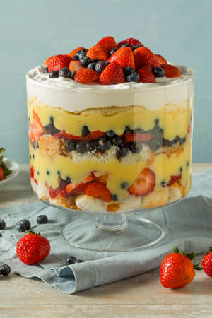 Sweet Homemade Strawberry Trifle Dessert with Custard and Cakeの写真素材