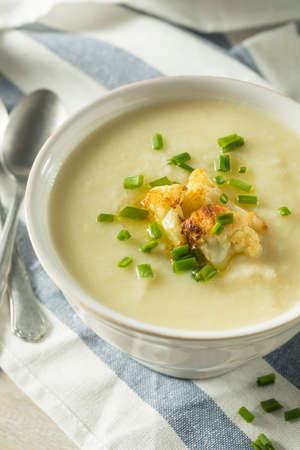Healthy Homemade Cauliflower Soup with Butter and Chivesの写真素材