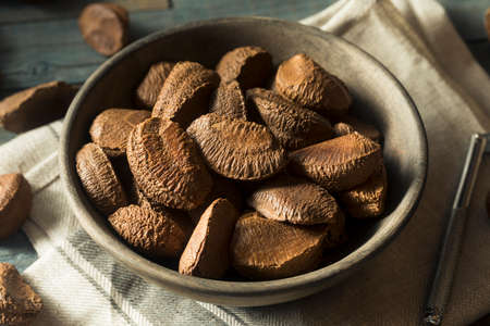 Raw Brown Organic Shelled Brazil Nuts in a Bowlの写真素材