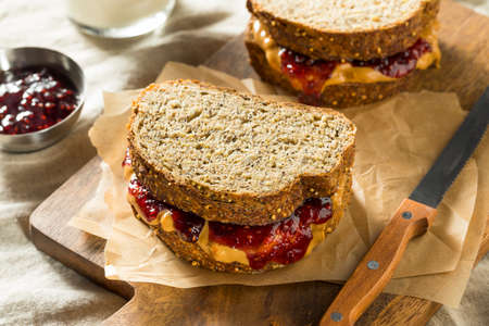 Sweet Homemade Gourmet Peanut Butter and Jelly Sandwich for Lunchの写真素材