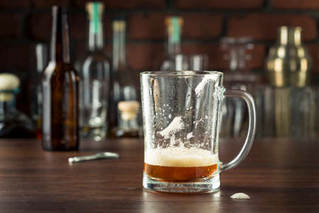 Refreshing Empty Beer Mug in a Barの写真素材