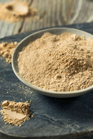 Dry Organic Maca Powder Superfood in  a Bowl