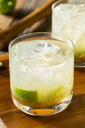 Homemade Brazilian Caipirinha Cocktails with Lime and Sugar
