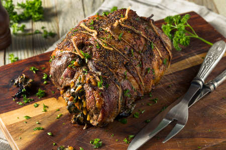 Roasted Stuffed Leg of Lamb with Spinach and Pine Nutsの写真素材