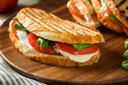 Healthy Grilled Basil Mozzarella Caprese Panini Sandwichの写真素材