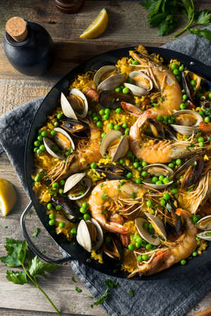 Homemade Spanish Seafood Paella with Prawns Mussels and Clamsの写真素材