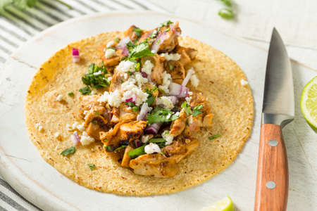 Homemade Chicken Tacos with Onion Cilantro and Cheeseの写真素材