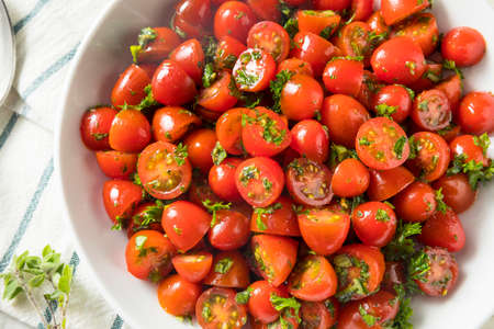 Healthy Homemade Cherry Tomato Salad with Herbs and Spicesの写真素材