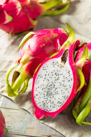 Raw Red Organic Dragon Fruit in a Bunchの写真素材