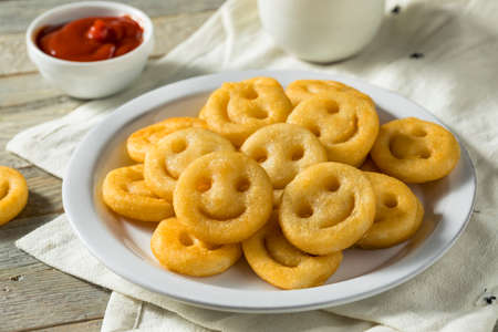 Homemade Smiley Face French Fries with Ketchupの写真素材