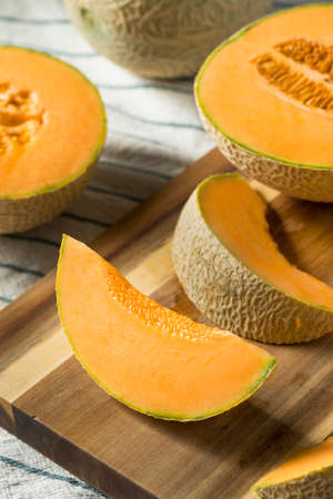 Raw Orange Organic Cantaloupe Cut into Slices