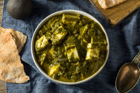 Homemade Healthy Palak Paneer Bowl with Naan Breadの写真素材
