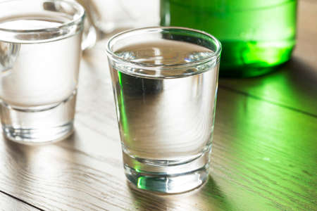 Alcoholic Clear Distilled Korean Soju in a Shot Glassの写真素材