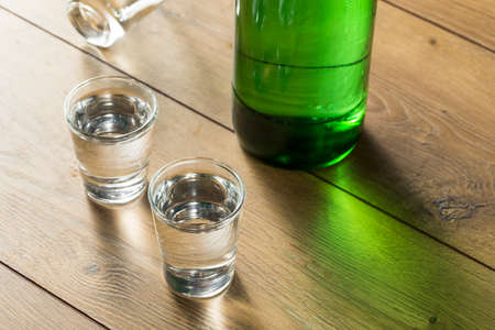 Alcoholic Clear Distilled Korean Soju in a Shot Glassの写真素材