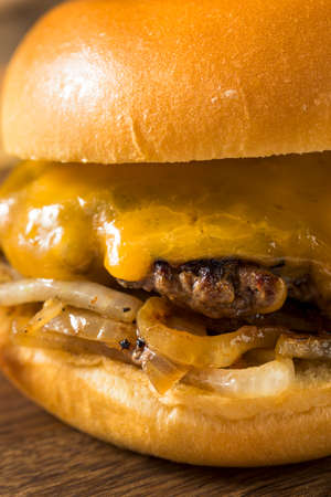 Homemade Oklahoma Fried Onion Cheeseburgers with Cheddarの写真素材