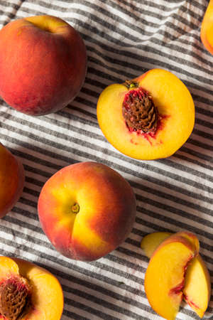 Raw Organic Yellow Peaches Ready to EAtの写真素材