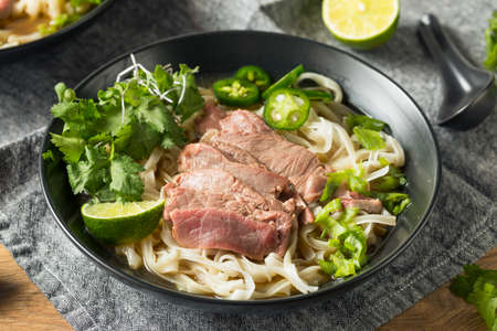 Homemade Beef Vietnamese Pho Soup with Veggiesの写真素材