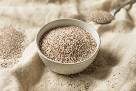 Dry Organic White Chia Seeds in a Bowlの写真素材