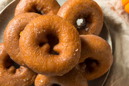 Homemade Pumpkin Spice Donuts Ready to Eatの写真素材