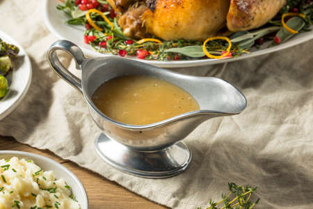 Dark Homemade Turkey Gravy for Thanksgiving Dinnerの写真素材