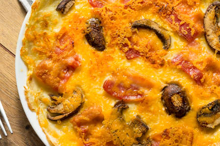 Savory Homemade Dutch Pannenkoeken Pancake with Bacon and Cheeseの写真素材