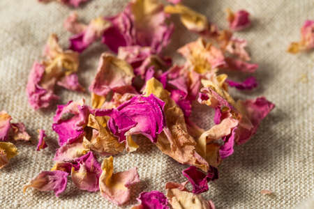Raw Dry Organic Rose Petals in a Bowlの写真素材