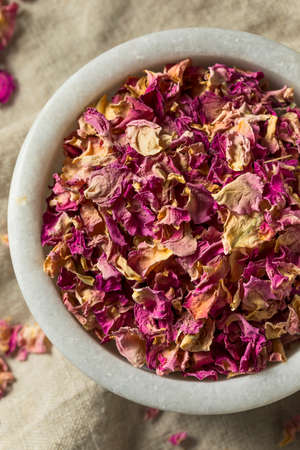 Raw Dry Organic Rose Petals in a Bowlの写真素材
