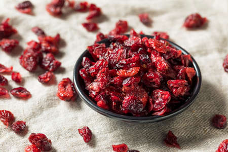 Organic Raw Dry Cranberries in a Bowlの写真素材