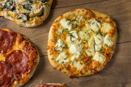 Gourmet Homemade Assorted Wood Fired Pizzas with Pepperoni Basil and Cheese