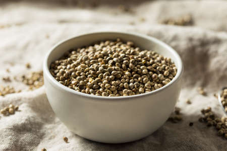 Organic Roasted Hemp Seeds in a Bowlの写真素材