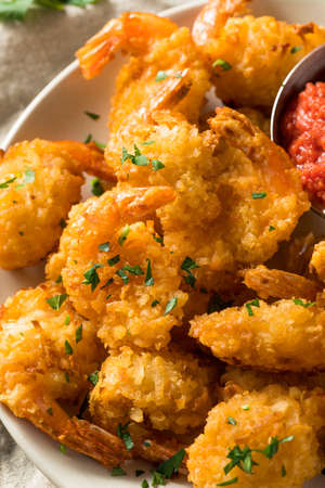Homemade Fried Coconut Shrimp with Cocktail Sauceの写真素材