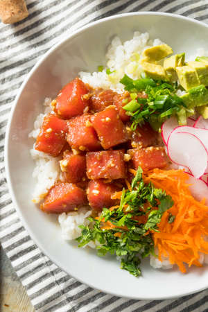 Homemade Ahi Tuna Poke Bowl with Rice and Vegetablesの写真素材
