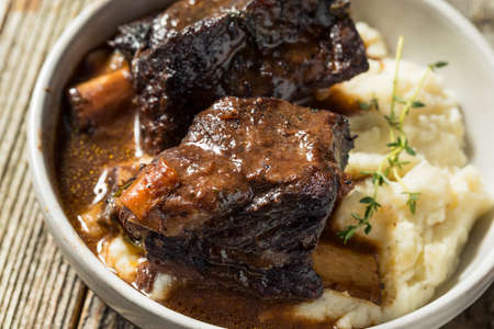 Homemade Braised Beef Short Ribs with Gravy and Potatoesの写真素材