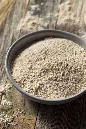 Organic Whole Wheat Flour in a Bowlの写真素材