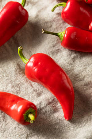 Raw Red Organic Fresno Peppers REady to Cookの写真素材
