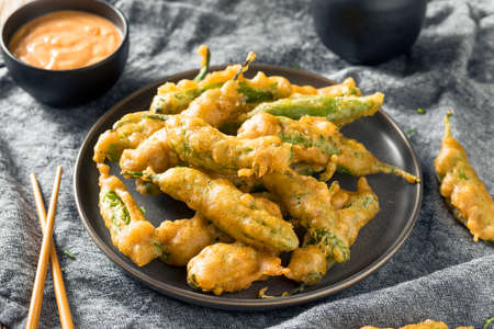 Homemade Deep Fried Shishito Peppers with Sauceの写真素材