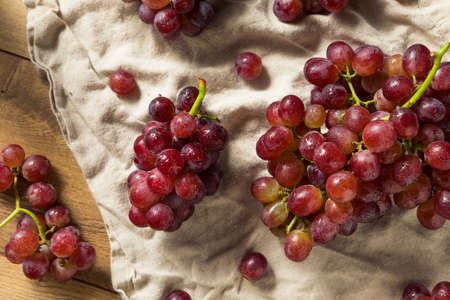 Raw Red Organic Grapes in a Cluster