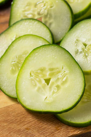 Raw Green Organic Cucumbers Ready to Eatの写真素材