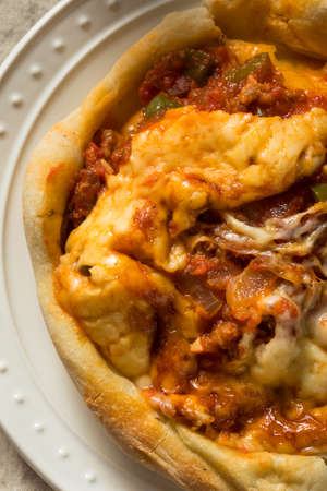 Homemade Chicago Pizza Pot Pie with Cheese and Sausageの写真素材