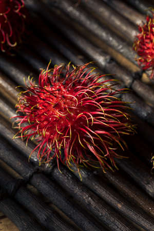 Raw Red Organic Rambutan Fruit Ready to Eatの写真素材
