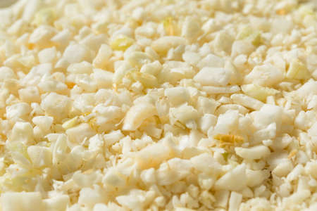 Homemade Organic Raw Cauliflower Rice in a Bowl