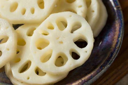 Raw Organic White Lotus Root in Slicesの写真素材