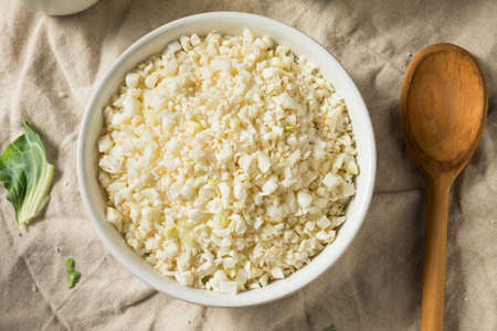 Homemade Organic Raw Cauliflower Rice in a Bowlの写真素材