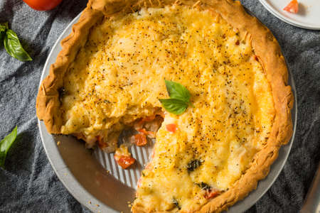 Homemade Cheesy Tomato Pie with Basil and Herbsの写真素材
