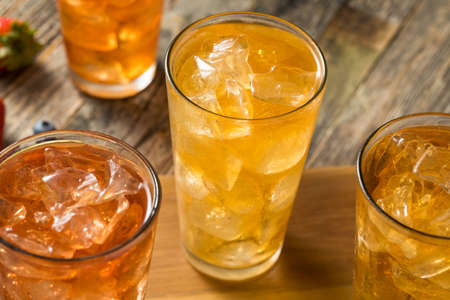 Cool Refreshing Flavored Berry Iced Teas with Lemon and Mintの写真素材