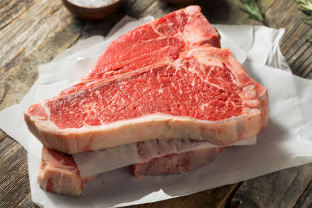 Raw Red Grass Fed T Bone Steak Ready to Cookの写真素材