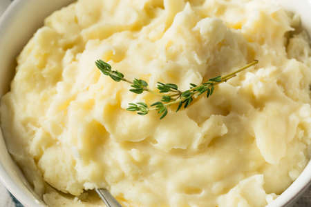 Homemade Thanksgiving Garlic Mashed Potatoes with Salt and Pepperの写真素材