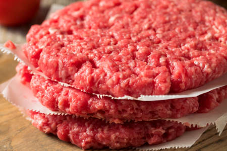 Raw Red Organic Hamuburger Pattys Ready to Cookの写真素材